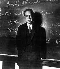 Photo of Niels Bohr at chalkboard